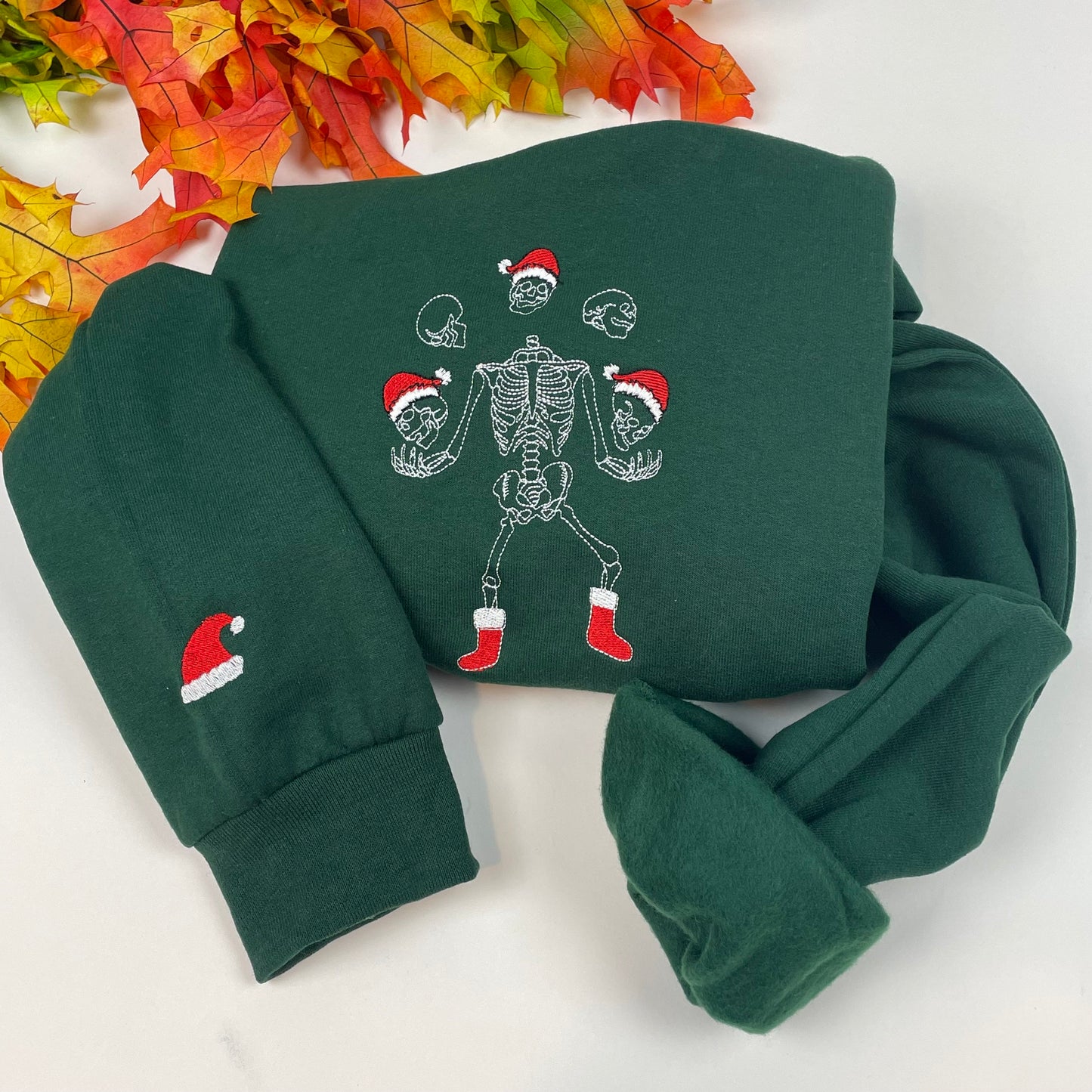 Skelton Dancing Christmas Embroidered Crewneck.