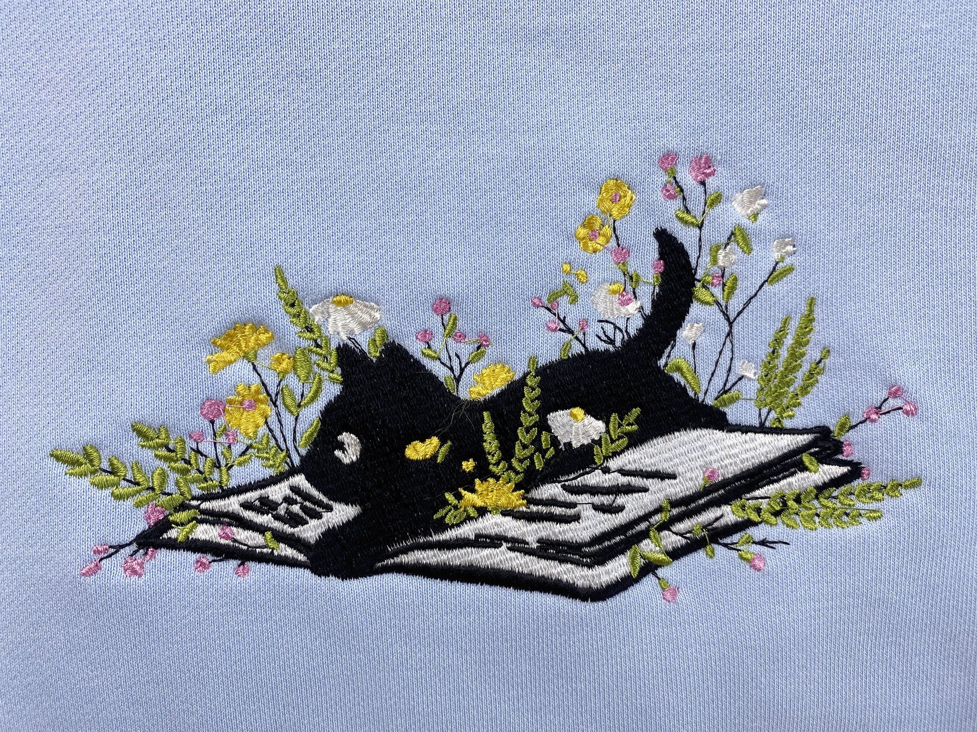 Embroidered Cute Cat Lying On Book With Flower Sweatshirt | Flower With Cat Embroidered Hoodie | Book Lover T-Shirt | Crew Neck Sweatshirt