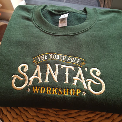 Santa Workshop Christmas Embroidered Sweatshirt, Christmas Jumper, Christmas Gift, North Pole Sweatshirt, Christmas Sweatshirt, Santa Jumper