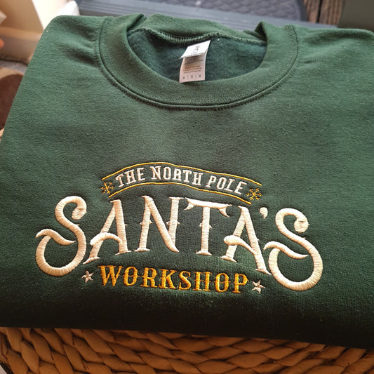 Santa Workshop Christmas Embroidered Sweatshirt, Christmas Jumper, Christmas Gift, North Pole Sweatshirt, Christmas Sweatshirt, Santa Jumper