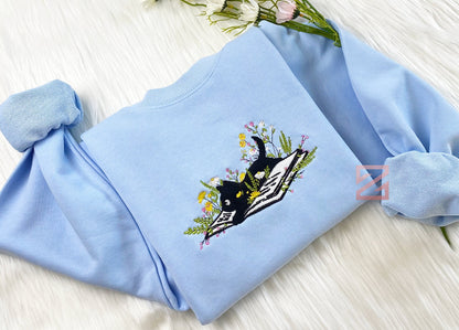 Cute Cat Lying On Book With Flower Embroidered Sweatshirt | Flower With Cat Embroidered Hoodie | Book Lover T-shirt | Crew Neck Sweatshirt